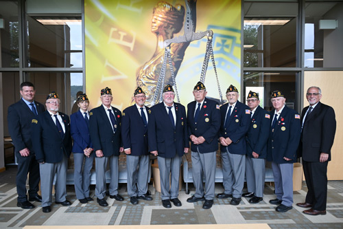 State Rep. Jamie Walsh (left) and Misericordia University President Dr. Daniel Myers (right) are pictured with members of the Shickshinny American Legion. 